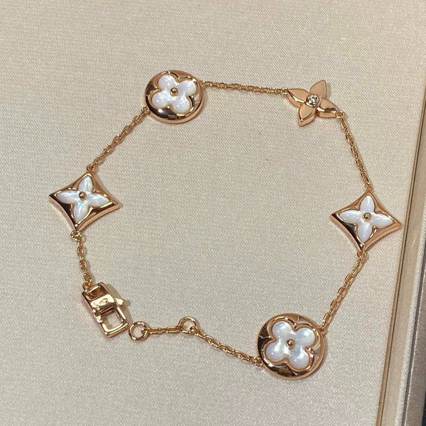 ˇMagic JewelryˇSTAR AND SUN 5 MOTIF MOP PINK GOLD BRACELET